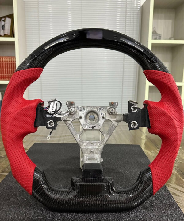CF Steering for 350z installed. Specs: Top round Galaxy LED Carbon Fiber Steering