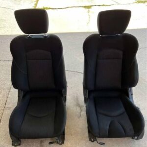 Pair of 370z seats with airbags still in them