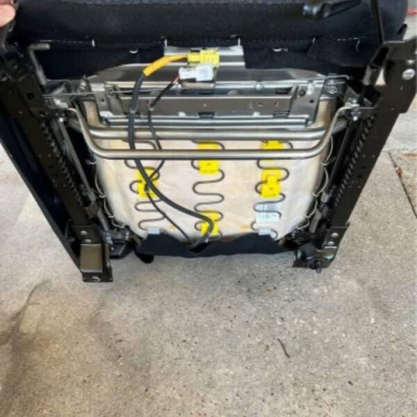 Pair of 370z seats with airbags still in them