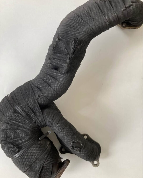 Tomei UEL header with silicone sprayed fiberglass wrap.